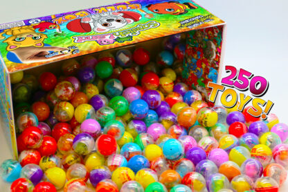 A box of colorful balls in the middle of a pile.