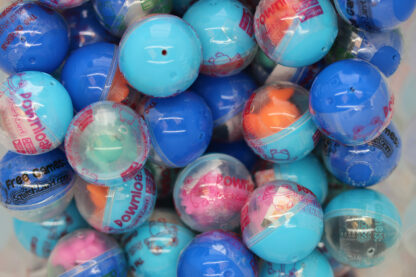 A pile of blue and orange balls in plastic.