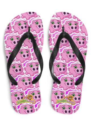 A pair of pink flip flops with faces on them.
