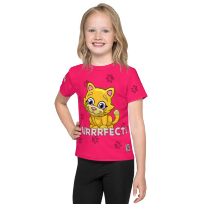 A girl wearing black pants and a pink shirt with a yellow cat.