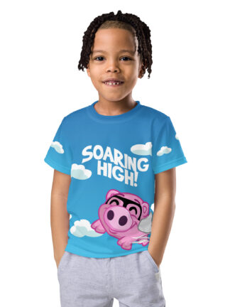 A kid wearing a t-shirt with the words " soaring high !" on it.