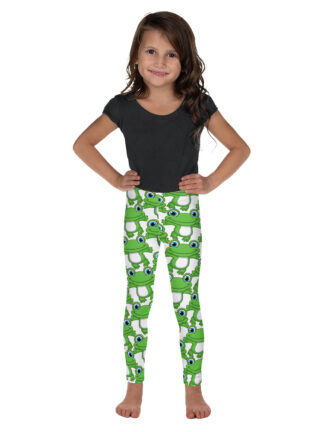 A little girl wearing green and white leggings.