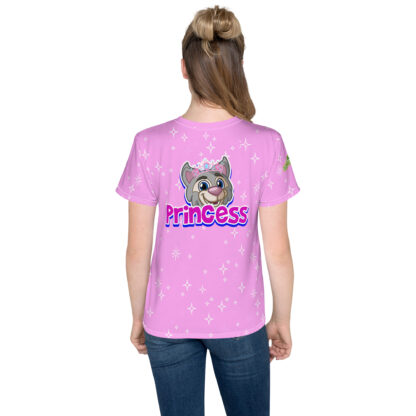 A girl wearing a pink shirt with the word princess on it.