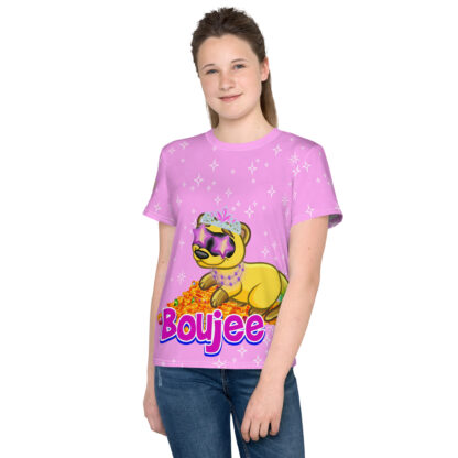 A girl wearing pink shirt and jeans with cat on it.
