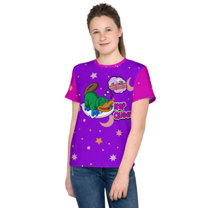 A girl wearing purple and pink shirt with cartoon design.