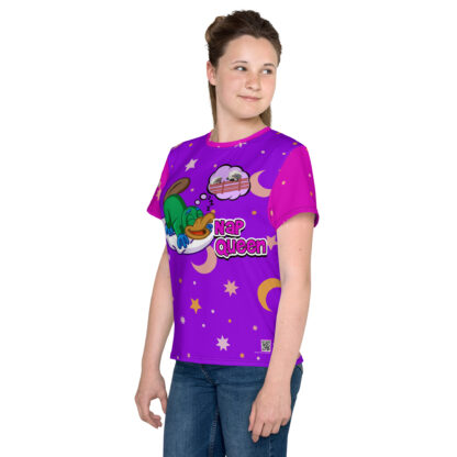 A girl wearing purple shirt with cartoon images.