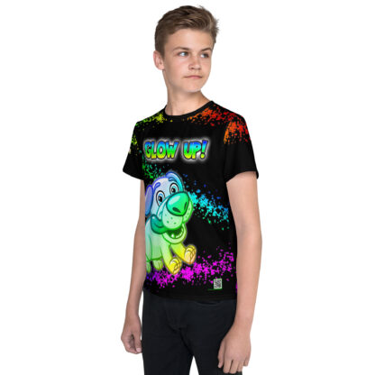 A kid wearing a t-shirt with a picture of a dinosaur