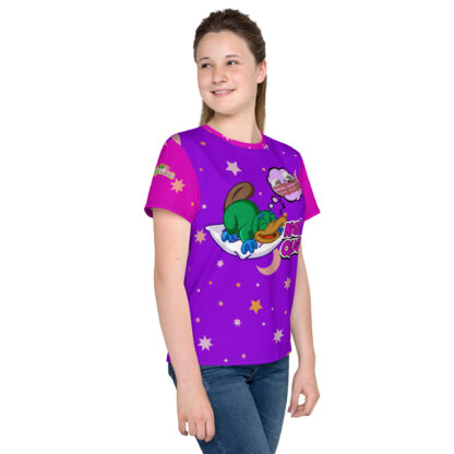 A girl wearing a purple shirt with cartoon images.
