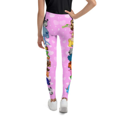 A girl wearing pink leggings with disney characters on it.
