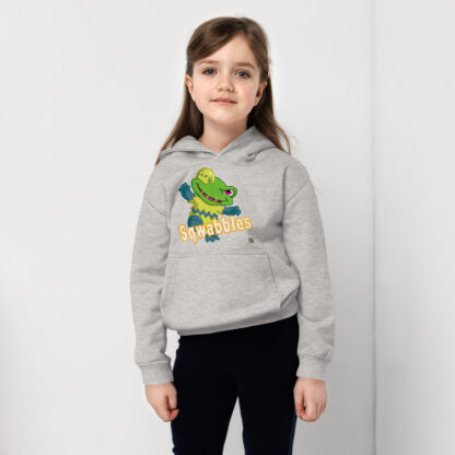 A girl wearing a gray hoodie with a cartoon of a turtle.