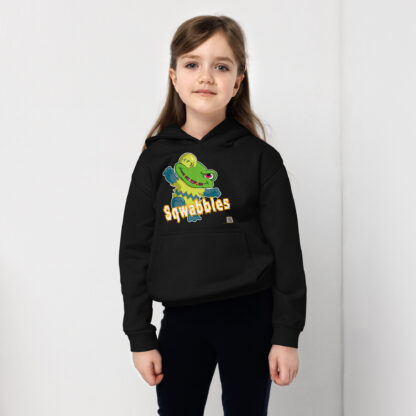 A little girl wearing black hoodie with squibbles logo