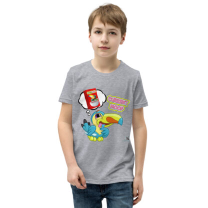 A boy wearing a gray t-shirt with a cartoon of a bird.