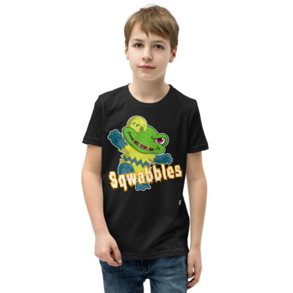 A kid wearing a black t-shirt with the word squabbles on it.