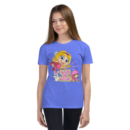 A girl wearing a blue t-shirt with a cartoon of a blond girl.