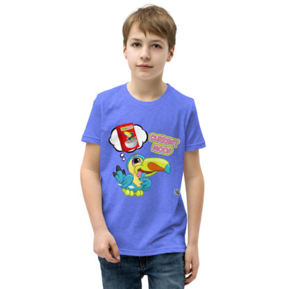 A kid wearing a blue shirt with a bird on it
