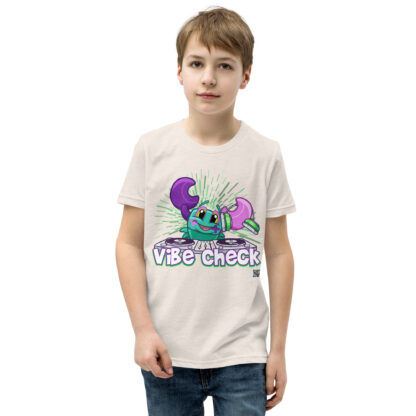 A boy wearing a t-shirt with the words " vibe check ".