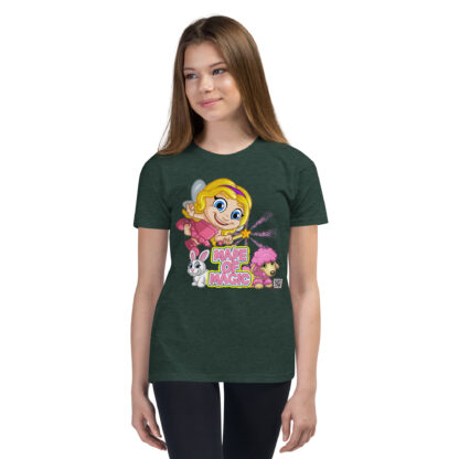 A girl wearing a t-shirt with an image of a fairy.