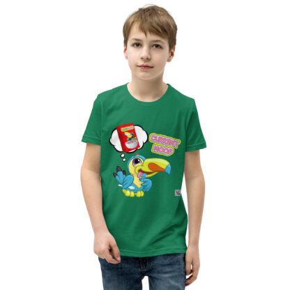 A kid wearing a green shirt with a bird on it