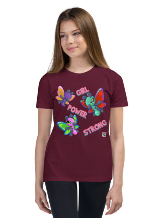 A girl wearing a maroon t-shirt with colorful butterflies.