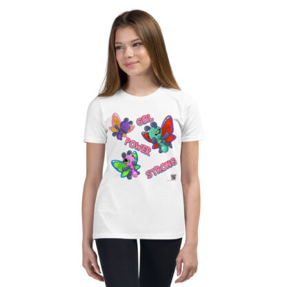 A girl wearing white pants and a t-shirt with colorful butterflies.